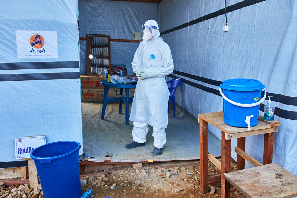 A health worker stands at the Evangelical Medical Center, in Bunia, eastern Congo, Friday, July 3, 2026, where Ebola clinical trials are scheduled to take place. (AP Photo/Dirole Lotsima Dieudonne)