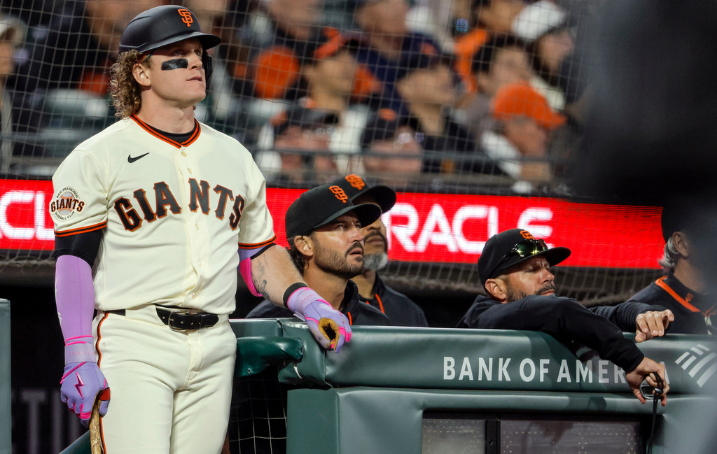 Harrison Bader (9) and manager Tony Vitello watch the final out as the San Francisco Giants played the New York Yankees in their 2026 Opening Day at Oracle Park in San Francisco, on Wednesday, March 25, 2026. (Santiago Mejia/San Francisco Chronicle via AP)