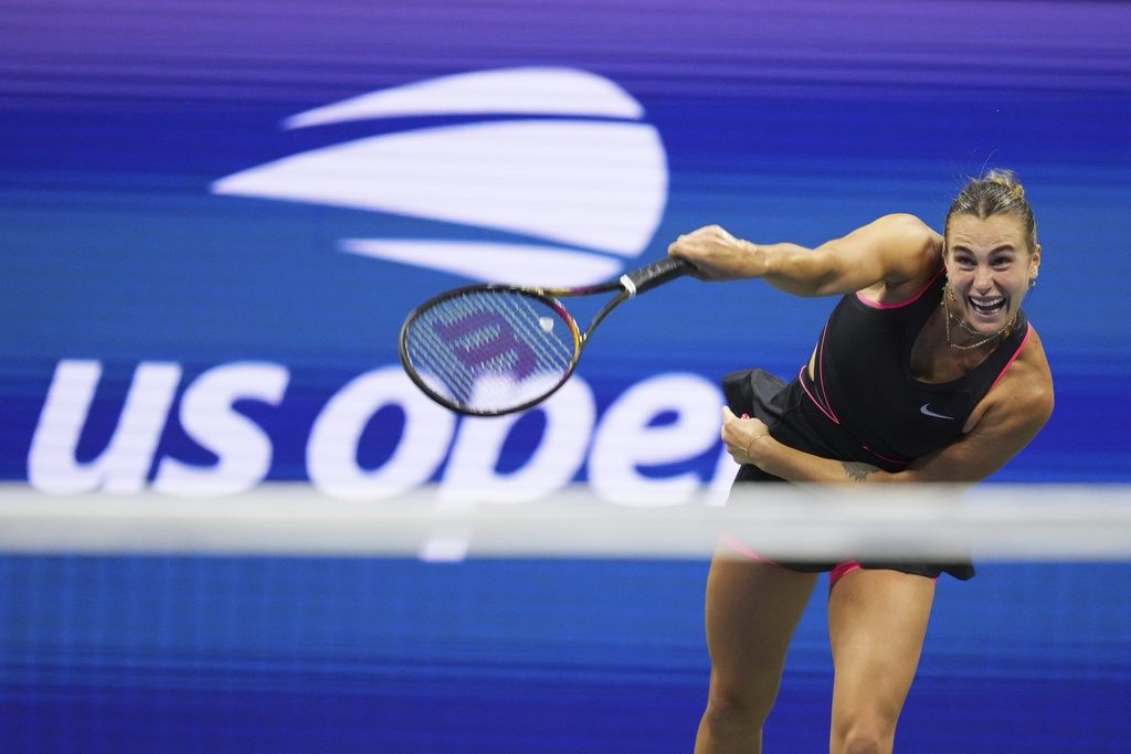 Aryna Sabalenka, of Belarus, serves to Jessica Pegula, of the United States, during the women's singles semifinals of the U.S. Open tennis championships, Thursday, Sept. 4, 2025, in New York. (AP Photo/Kirsty Wigglesworth)