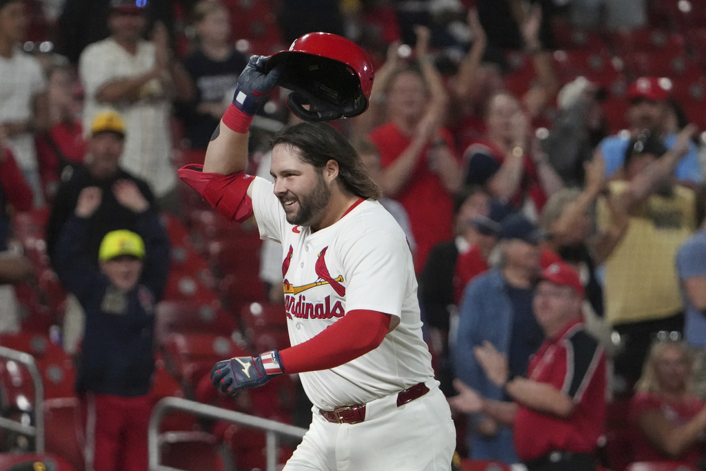 St. Louis Cardinals' Alec Burleson celebrates after hitting a walk-off home run to defeat the Pittsburgh Pirates in the ninth inning of a baseball game Monday, Aug. 25, 2025, in St. Louis. (AP Photo/Jeff Roberson)