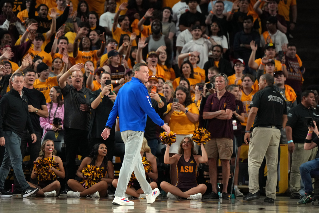 Kansas head coach Bill Self walks off the court after getting ejected from the game during the first half of an NCAA college basketball game against Arizona State, Tuesday, March 3, 2026, in Tempe, Ariz. (AP Photo/Rick Scuteri)