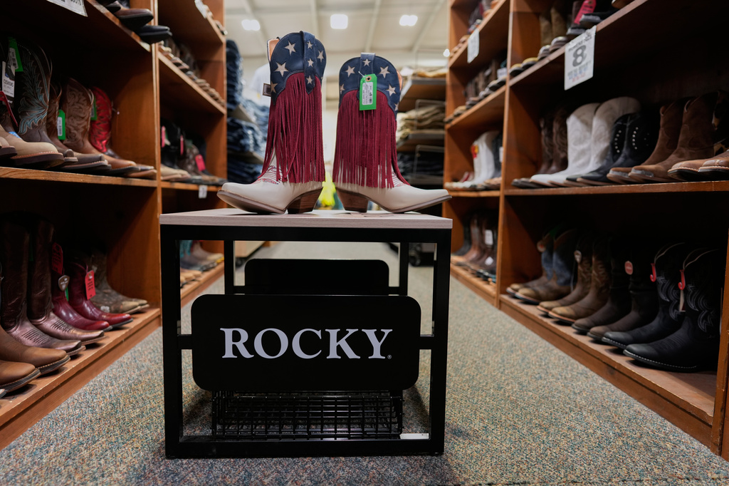 American Flag themed women's cowboy boots are seen at Boot Country Work Country in Batavia, Ohio, Tuesday, June 30, 2026. (AP Photo/Carolyn Kaster)