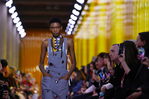 A model wears a creation as part of the Miu Miu Spring/Summer 2026 collection presented in Paris, Monday, Oct. 6, 2025. (AP Photo/Aurelien Morissard) A model wears a creation as part of the Miu Miu Spring/Summer 2026 collection presented in Paris, Monday, Oct. 6, 2025. (AP Photo/Aurelien Morissard)