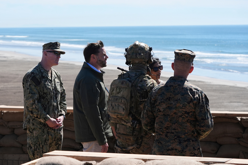Vice President JD Vance, second left, and second lady Usha Vance, fourth from left, watch a demonstration by Marines during activities to mark the upcoming Marine Corps' 250th anniversary Saturday, Oct 18, 2025, on Marine Corps Base Camp Pendleton in Camp Pendleton, Calif. (AP Photo/Gregory Bull)