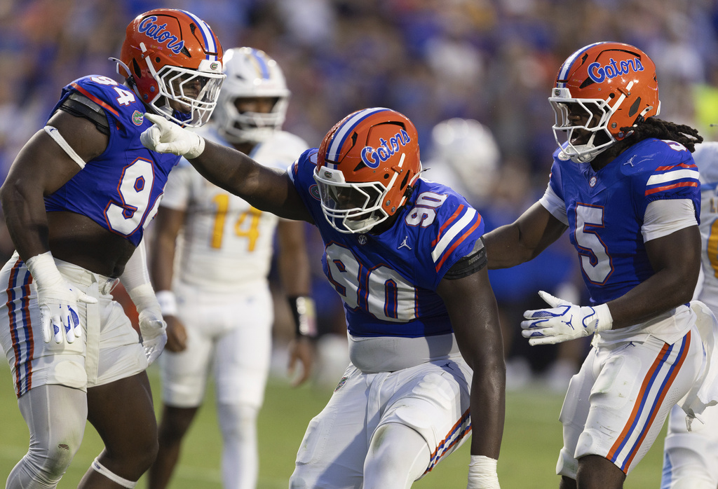 Florida defensive lineman Brendan Bett (90) celebrates a tackle against LIU Brooklyn during the first half of an NCAA college football game Saturday, Aug. 30, 2025, in Gainesville, Fla. (AP Photo/Alan Youngblood)