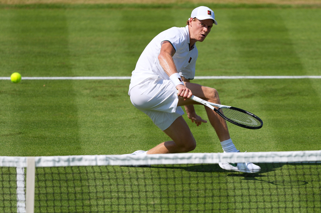 Jannik Sinner of Italy returns during a tennis exhibition match against Cameron Norrie of Great Britain at the Hurlingham Tennis Club in London, Wednesday, June 24, 2026.(AP Photo/Kirsty Wigglesworth)