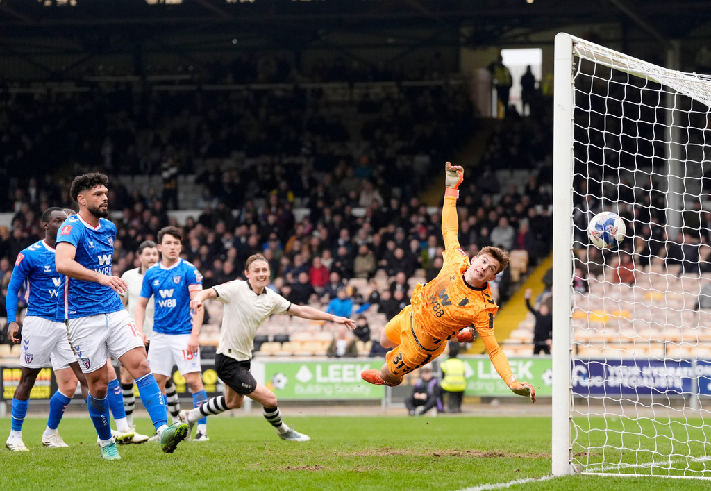 Port Vale's Ben Waine scores his side's first goal of the game, during the FA Cup fifth round soccer match between Sunderland and Port Vale, in Stoke on Trent, England, Sunday March 8, 2026. (Nick Potts/PA via AP)