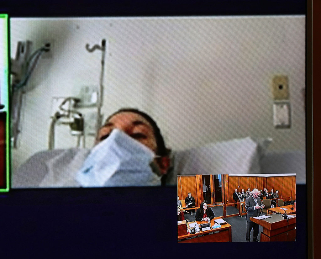 FILE - In this image from video, Lindsay Clancy, with a surgical mask over her face, appears from the hospital for her arraignment on charges regarding the death of her three children, at Plymouth District Court in Plymouth, Mass., on Feb. 7, 2023. (David Ryan/The Boston Globe via AP, Pool, File)