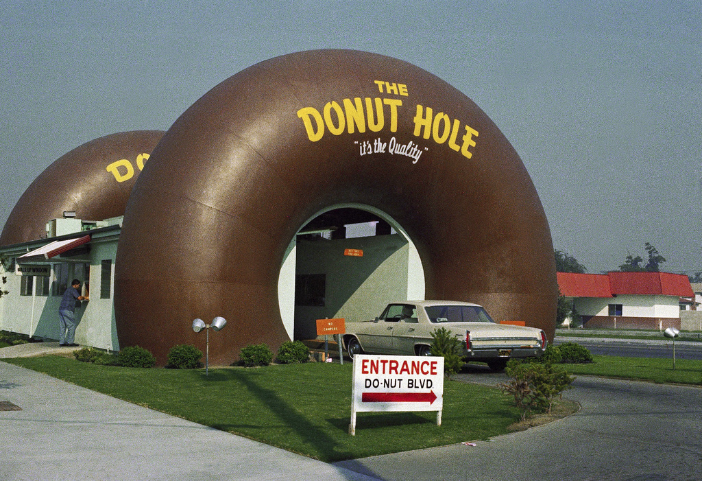 FILE - A drive-thru coffee and donut shop the Donut Hole is seen in Los Angeles in November 1970. (AP Photo/David F. Smith, File)