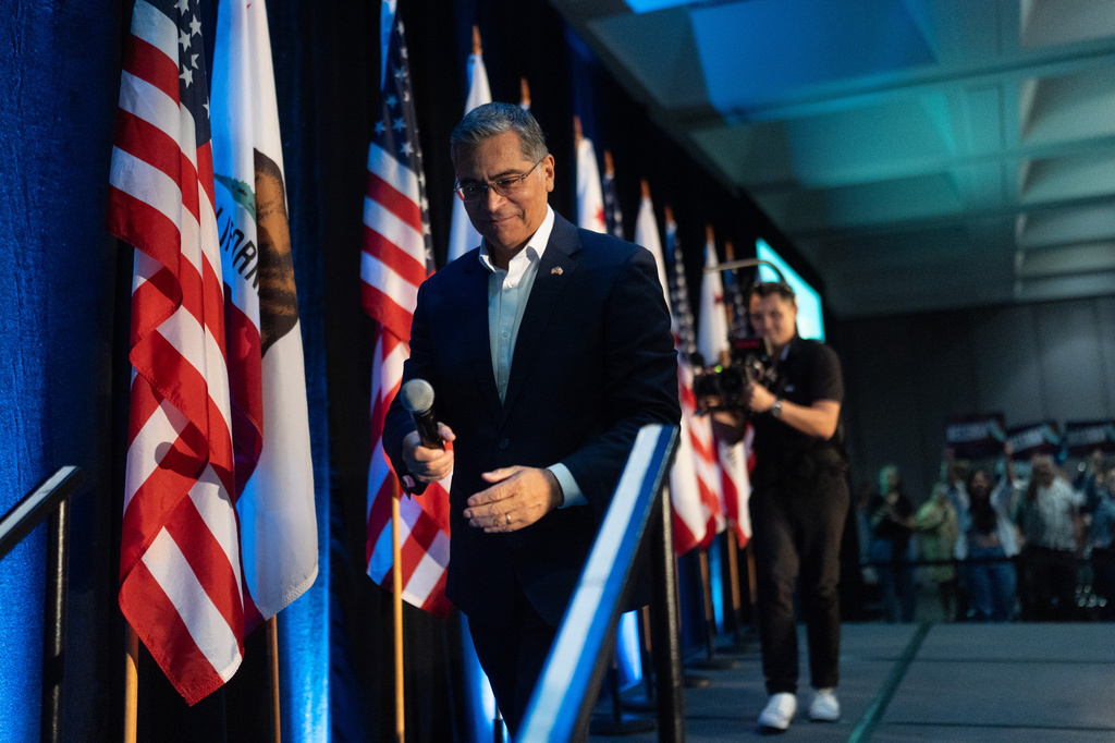 California gubernatorial candidate Xavier Becerra walks down the steps after speaking at a campaign event in Los Angeles, Saturday, April 18, 2026. (AP Photo/Jae C. Hong)