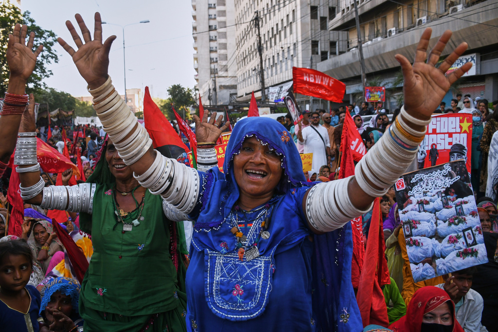 Women's right activists take part in a rally to mark International Women's Day, in Karachi, Pakistan, Sunday, March 8, 2026. (AP Photo/Ali Raza)