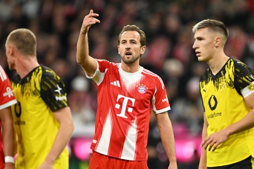 Bayern's Harry Kane, centre, during the Bundesliga soccer match between Bayern Munich and Borussia Dortmund in Munich, Germany, Saturday, Oct. 18, 2025. (AP Photo/Lennart Preiss) Bayern's Harry Kane, centre, during the Bundesliga soccer match between Bayern Munich and Borussia Dortmund in Munich, Germany, Saturday, Oct. 18, 2025. (AP Photo/Lennart Preiss)