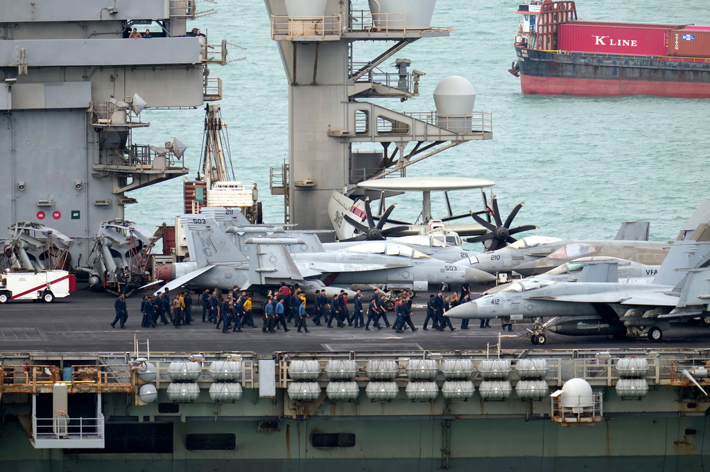 Navy personnel walk on the deck of the U.S. Navy aircraft carrier USS Abraham Lincoln as it arrives at the port in Laem Chabang, Chonburi, Thailand, Wednesday, Sept. 2, 2026. (AP Photo/Sakchai Lalit)