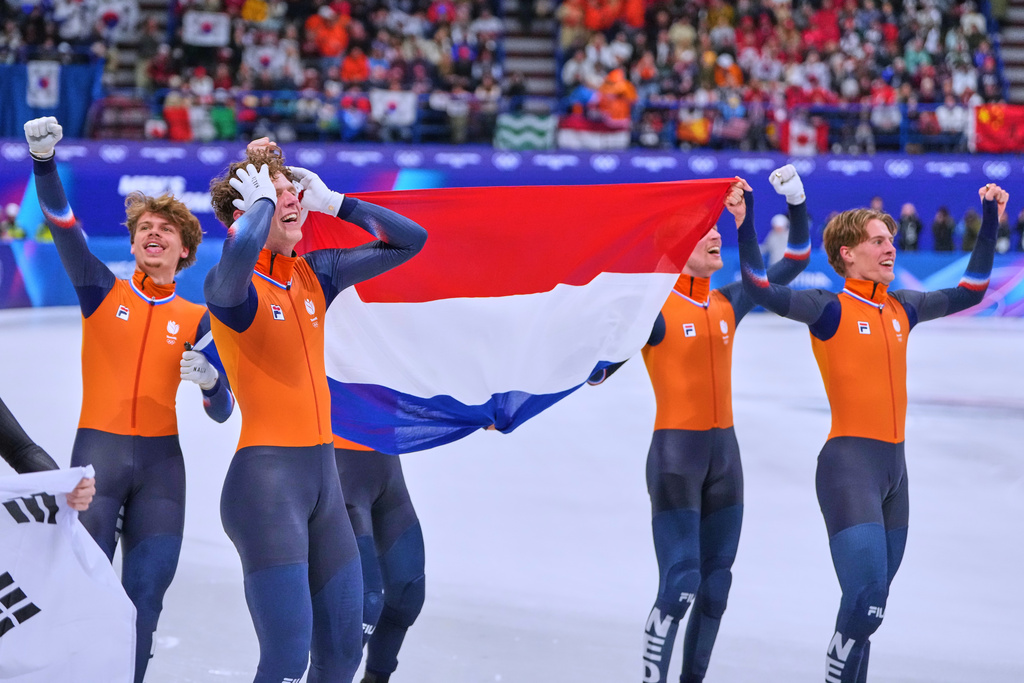 Team Netherlands celebrates after a short track speed skating men's 5000 meters relay final at the 2026 Winter Olympics, in Milan, Italy, Friday, Feb. 20, 2026. (AP Photo/Natacha Pisarenko)