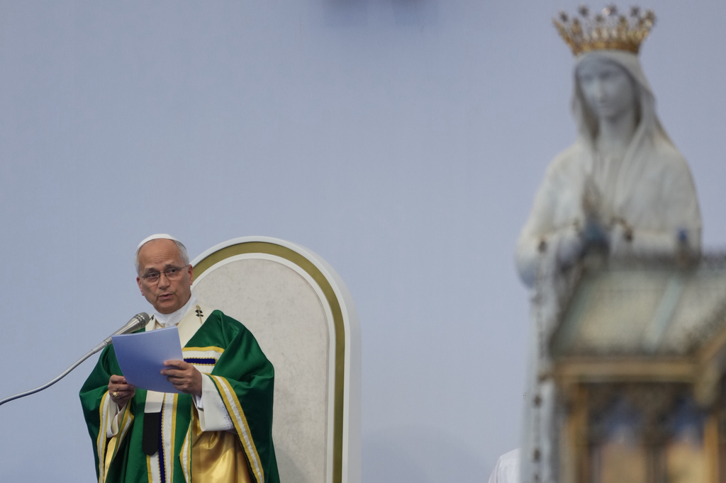 Pope Leo XIV presides over Mass at the Sanctuary of Our Lady of Lourdes, Sunday, Sept. 27, 2026, in Lourdes, France. (AP Photo/Gregorio Borgia)