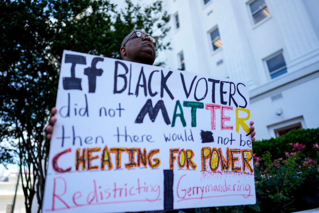 Travis Jackson, of Montgomery, stands during a press conference outside the Alabama state house during a special session of the Alabama Legislature, Tuesday, May 5, 2026, in Montgomery, Ala. (AP Photo/Mike Stewart)