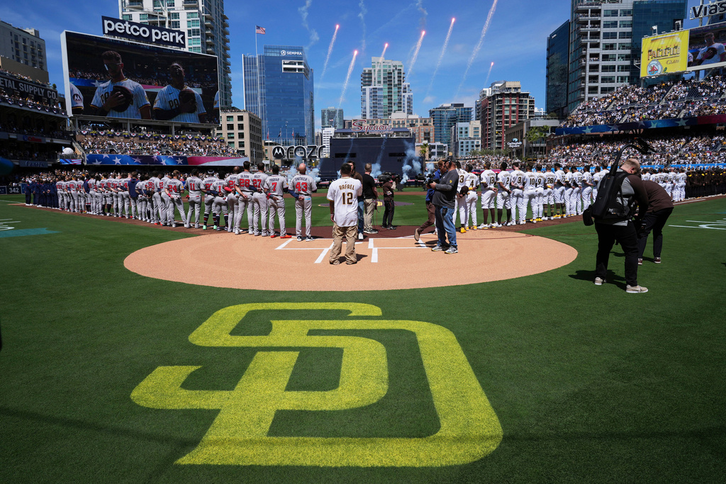 FILE - Fireworks explode during the singing of the national anthem before an opening day baseball game between the San Diego Padres and the Atlanta Braves Thursday, March 27, 2025, in San Diego. (AP Photo/Gregory Bull, File)