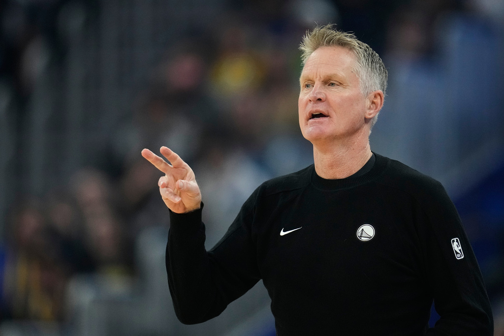 Golden State Warriors head coach Steve Kerr gestures during the first half of an NBA basketball game against the Minnesota Timberwolves, Friday, Dec. 12, 2025, in San Francisco. (AP Photo/Godofredo A. Vásquez)