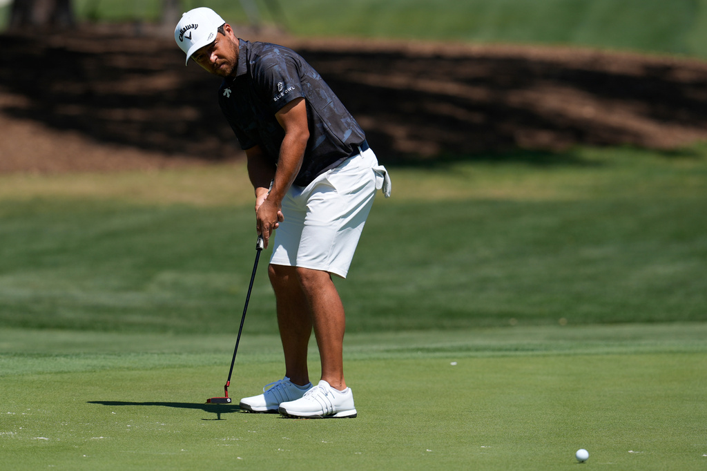 Xander Schaufele putts on the 10th green at the RBC Heritage golf tournament, Wednesday, April 15, 2026, in Hilton Head Island, S.C. (AP Photo/Mike Stewart)