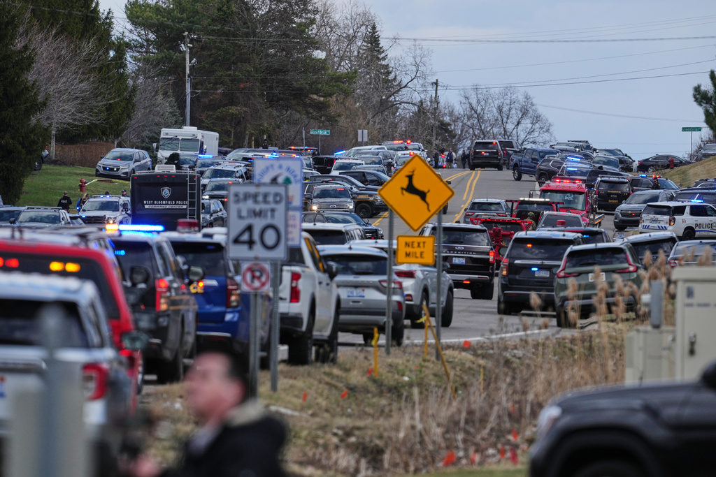 Law enforcement respond to a call at Temple Israel synagogue Thursday, March 12, 2026, in West Bloomfield Township, Mich. (AP Photo/Paul Sancya)