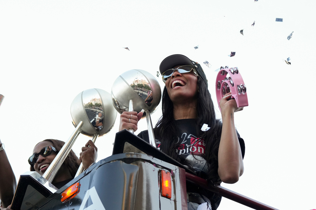 Las Vegas Aces forward A'ja Wilson celebrates during a rally to celebrate the team's WNBA championship Friday, Oct. 17, 2025, in Las Vegas. (AP Photo/Candice Ward)
