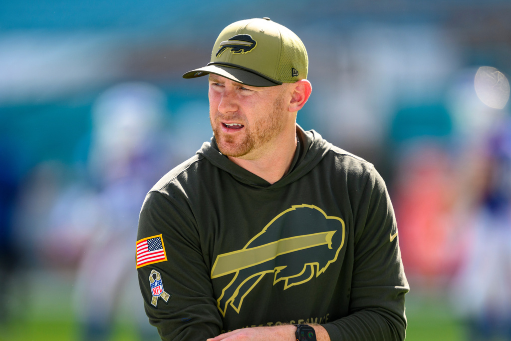 FILE - Buffalo Bills offensive coordinator Joe Brady stands on the field before an NFL football game against the Miami Dolphins, Nov. 9, 2025, in Miami Gardens, Fla. (AP Photo/Doug Murray, File)
