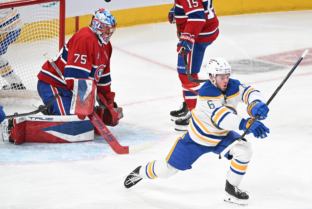 Buffalo Sabres' Zach Benson (6) reacts after scoring against Montreal Canadiens goaltender Jakub Dobes (75) during third period, second round, Game 4, NHL playoff hockey action in Montreal on Tuesday, May 12, 2026. (Graham Hughes/The Canadian Press via AP)