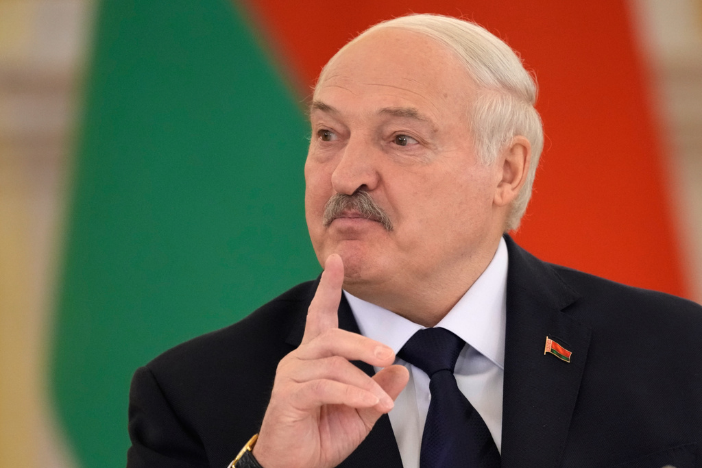 Belarusian President Alexander Lukashenko gestures during a meeting of the supreme council of the Union State with Russian President Vladimir Putin at the Grand Kremlin Palace in Moscow, Thursday, Feb. 26, 2026. (AP Photo/Pavel Bednyakov, Pool)