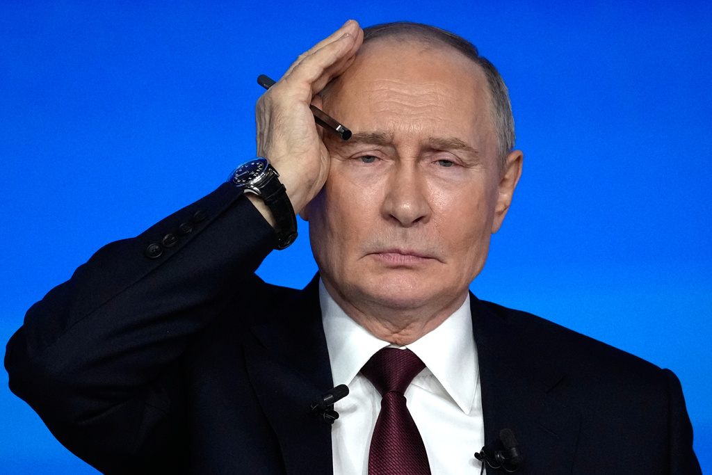 Russian President Vladimir Putin gestures while speaking during his annual news conference and call-in show at Gostinny Dvor, in Moscow, on Friday, Dec. 19, 2025. (AP Photo/Pavel Bednyakov)