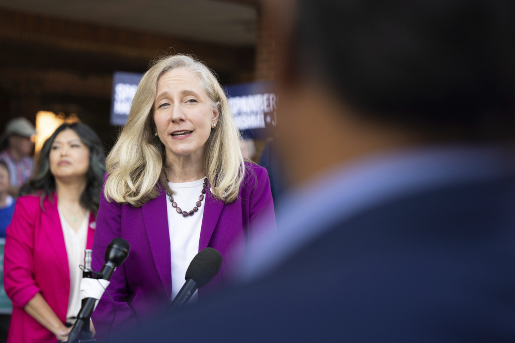 Democratic gubernatorial candidate Abigail Spanberger speaks to members of the press on the first day of early voting in Henrico County, Va., Friday, Sept. 19, 2025. (Mike Kropf/Richmond Times-Dispatch via AP)