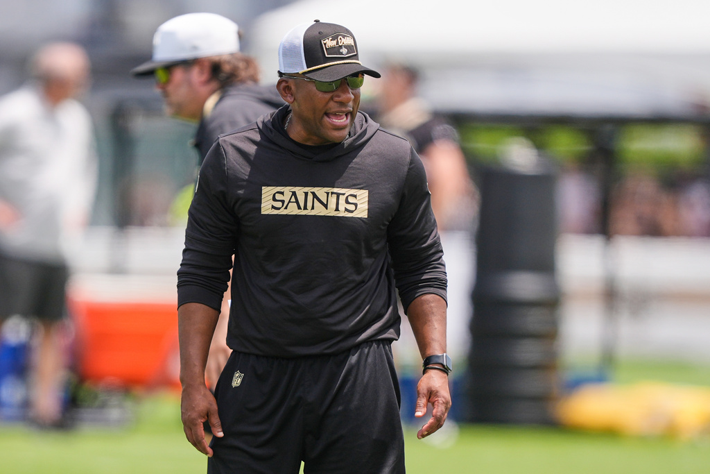 FILE - New Orleans Saints defensive pass game coordinator Terry Joseph watches drills during practice at NFL football minicamp in Metairie, La., Wednesday, June 11, 2025. (AP Photo/Gerald Herbert, File)