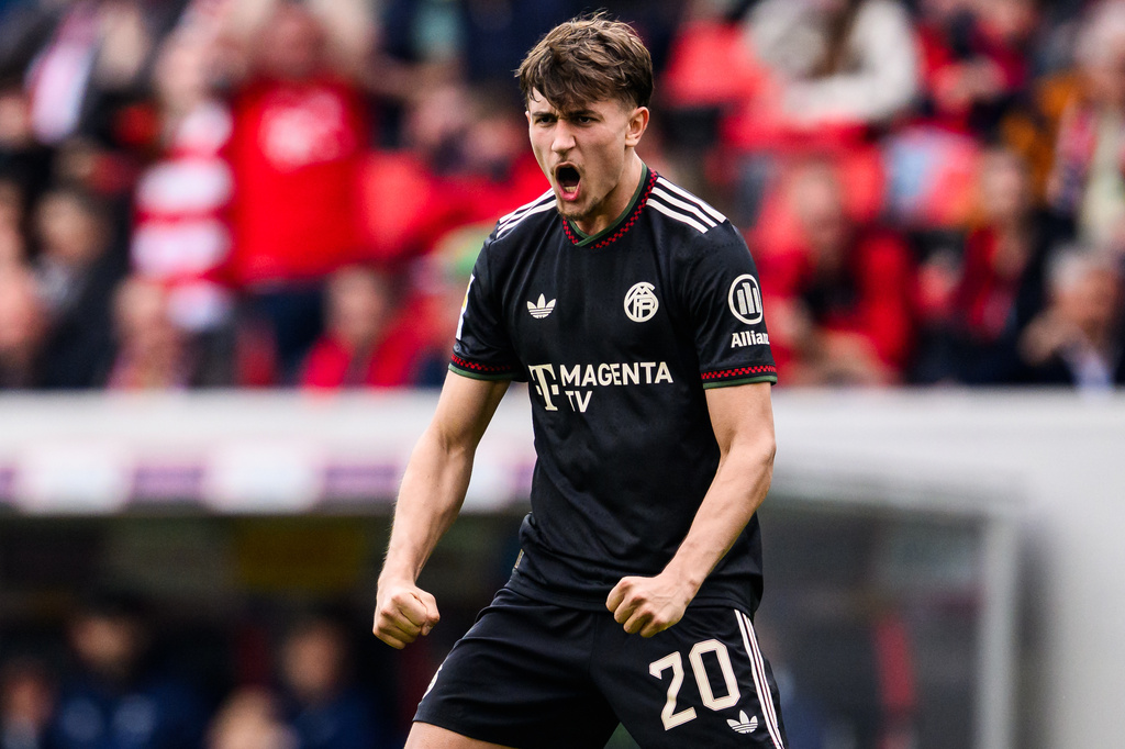 Bayern's Tom Bischof celebrates after scoring during the German Bundesliga soccer match between SC Freiburg and Bayern Munich in Freiburg im Breisgau, Germany, Saturday, April 4, 2026. (Tom Weller/dpa via AP)