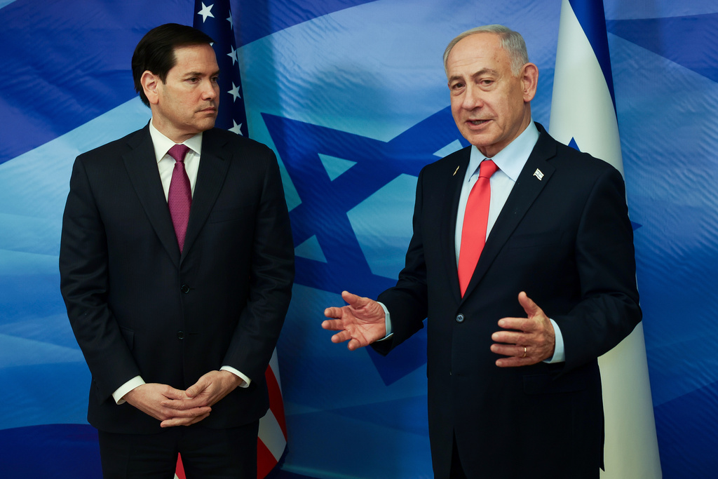 Israeli Prime Minister Benjamin Netanyahu speaks next to U.S. Secretary of State Marco Rubio at the Prime Minister's Office in Jerusalem, Thursday, Oct. 23, 2025. (Ronen Zvulun/Pool Photo via AP)
