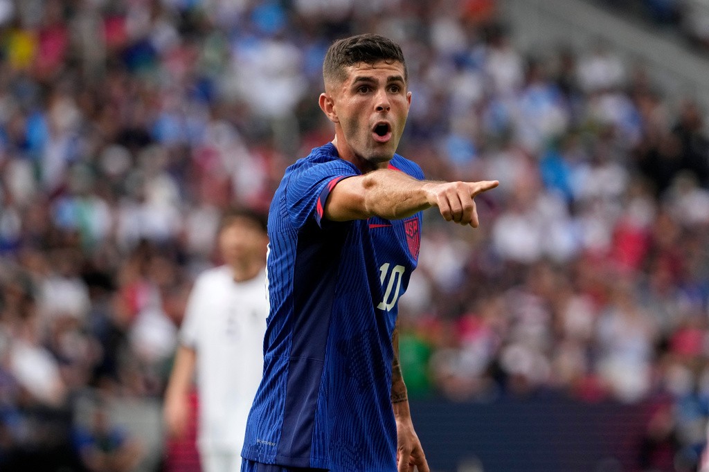 FILE - United States' Christian Pulisic points during the first half of an international friendly soccer match against Uzbekistan Saturday, Sept. 9, 2023, in St. Louis. (AP Photo/Jeff Roberson, File)