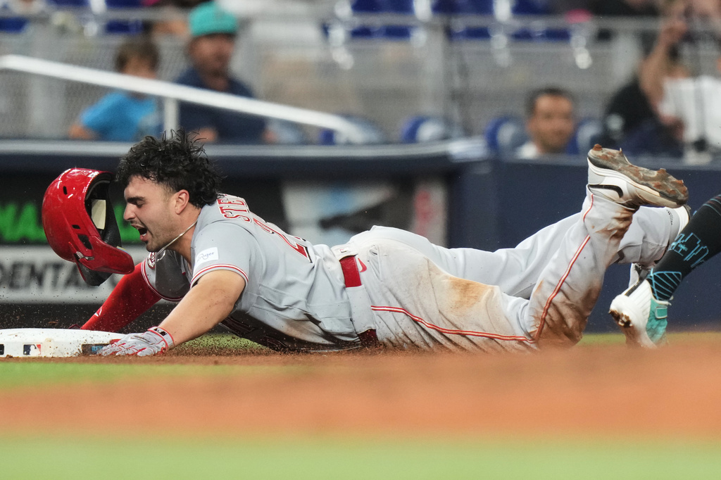 Cincinnati Reds' Sal Stewart is out at third during the fourth inning of a baseball game against the Miami Marlins, Monday, April 6, 2026, in Miami. (AP Photo/Lynne Sladky)
