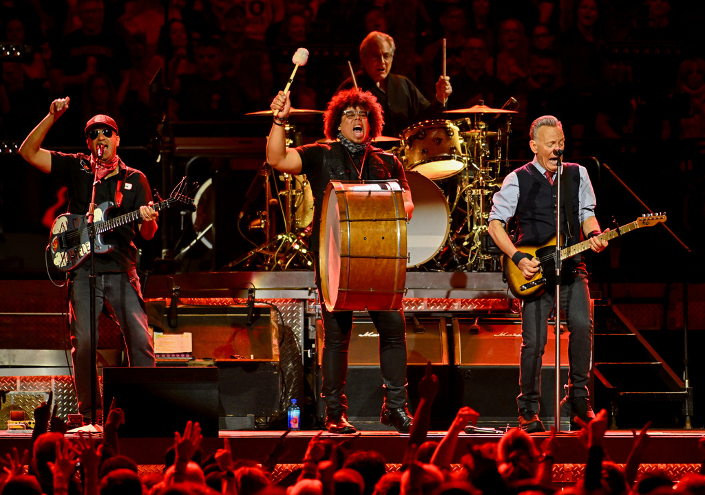 Tom Morello, from left, Jake Clemons and Bruce Springsteen perform during the "Land of Hope and Dreams" tour at Madison Square Garden on Monday, May 11, 2026, in New York. (Photo by Evan Agostini/Invision/AP)