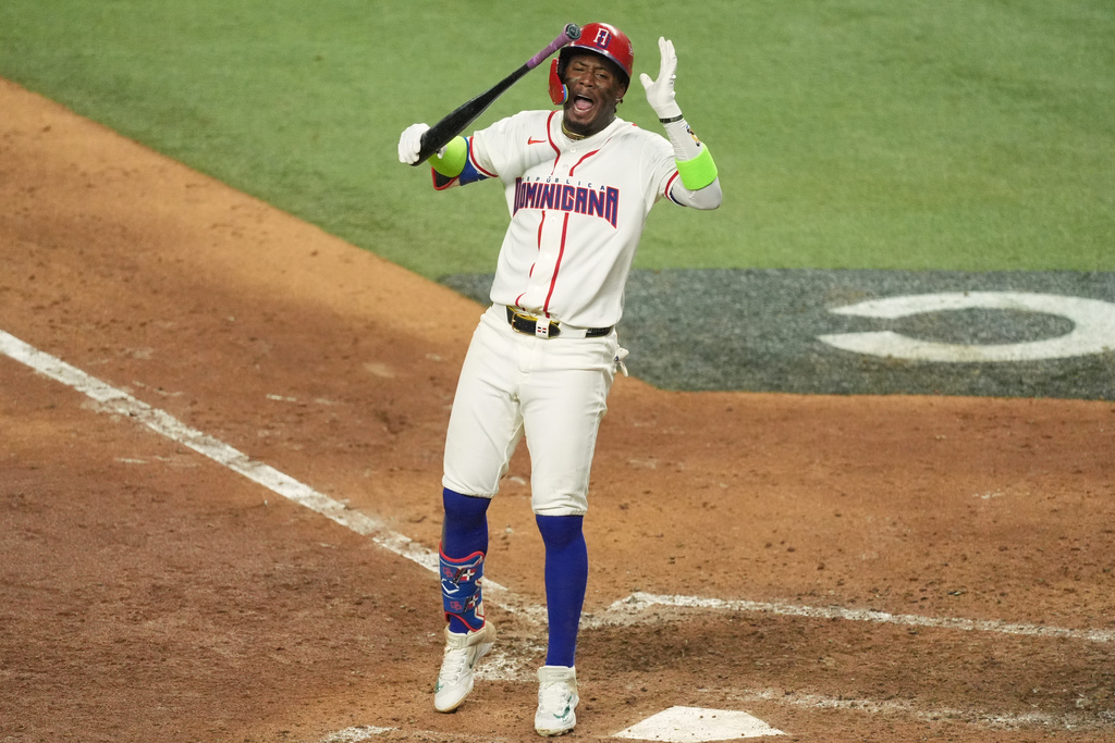 Dominican Republic Geraldo Perdomo reacts after striking out at the end of the ninth inning of a World Baseball Classic semifinal game against the United States, Sunday, March 15, 2026, in Miami. (AP Photo/Rebecca Blackwell)