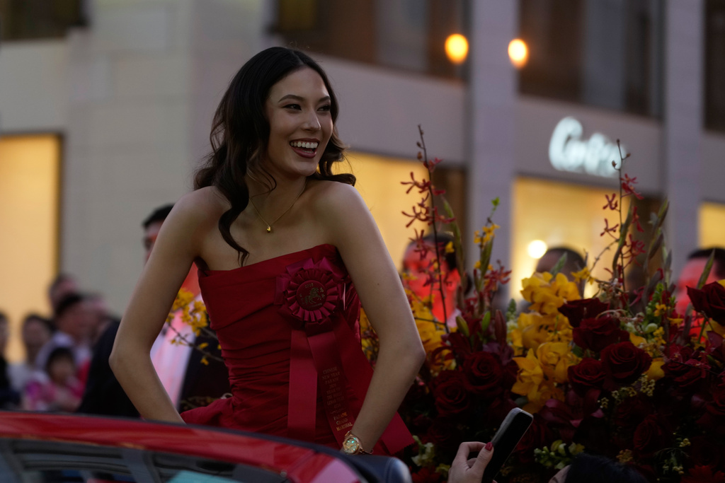 Olympic gold medalist and Grand Marhsal Eileen Gu smiles during the Chinese New Year Parade in San Francisco, Saturday, March 7, 2026. (AP Photo/Jeff Chiu)