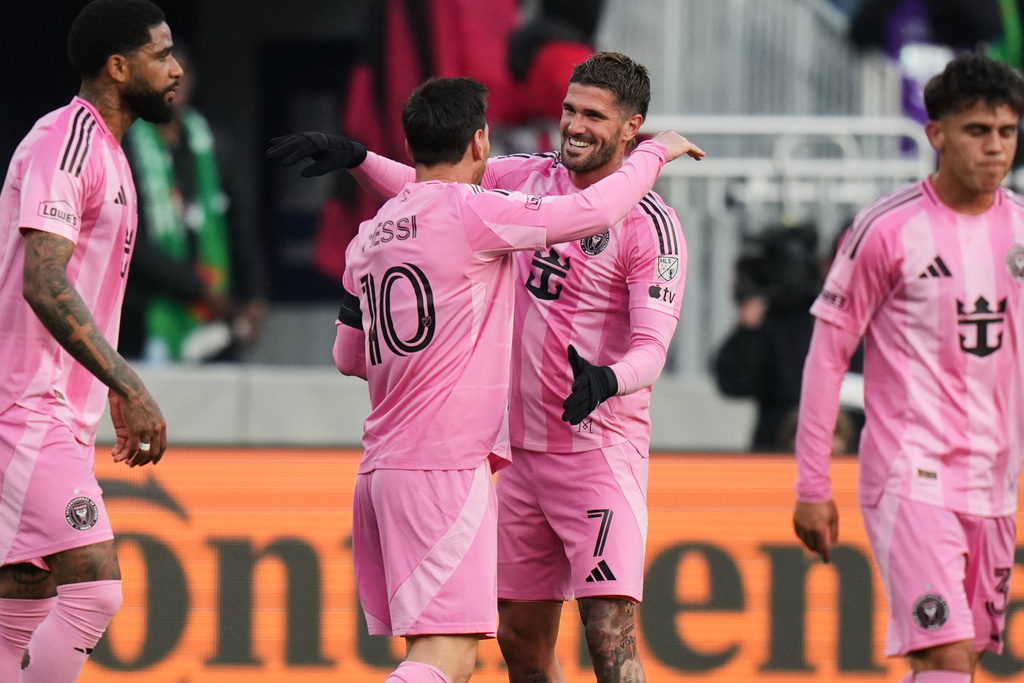 Inter Miami forward Lionel Messi (10) celebrates after his goal against D.C. United with midfielder Rodrigo de Paul (7) during the first half of an MLS soccer match, Saturday, March 7, 2026, in Baltimore. (AP Photo/Stephanie Scarbrough)