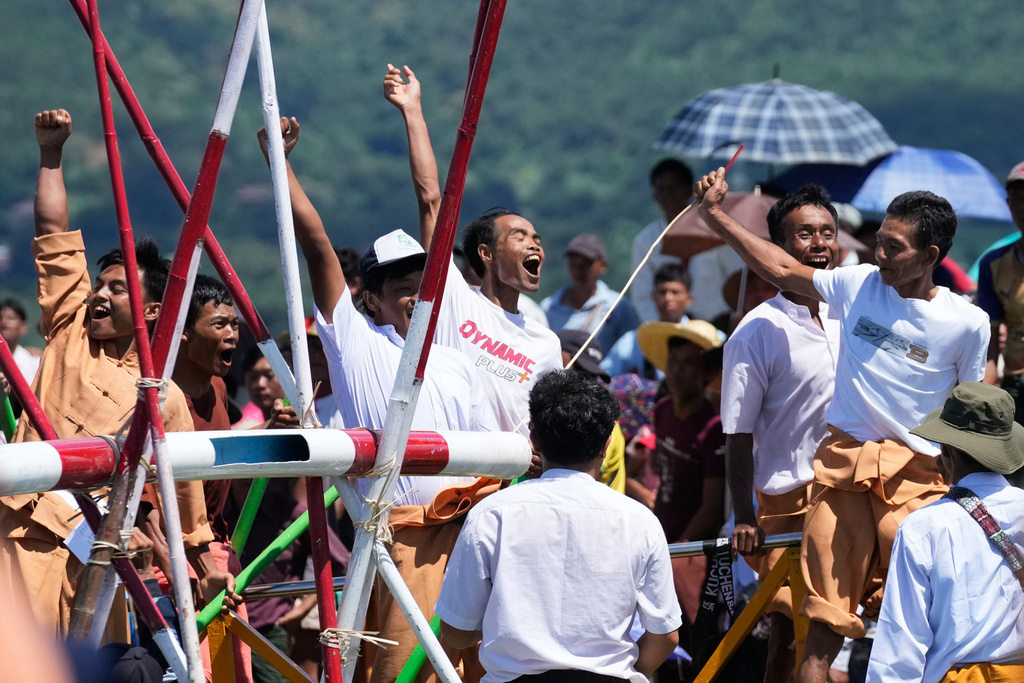 Intha ethnic people celebrate during a traditional boats racing competition to mark the Phaung Daw Oo pagoda festival Friday, Sept. 26, 2025, in Inle Lake, southern Shan State, Myanmar. (AP Photo/Thein Zaw)