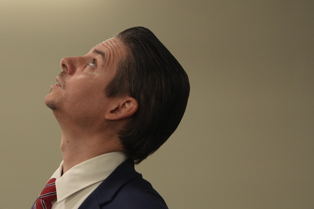 Matt Floca, the John F. Kennedy Center for the Performing Arts' new executive director and chief operating officer, looks up at structural damage in the loading dock area during a media tour, Wednesday, April 22, 2026, in Washington. (AP Photo/Julia Demaree Nikhinson)