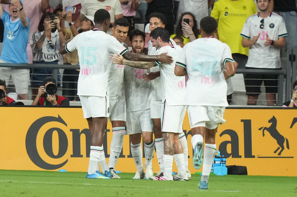 Inter Miami players celebrate Nashville's own goal during the first half of an MLS soccer match Saturday, Sept. 12, 2026, in Miami. (AP Photo/Marta Lavandier)