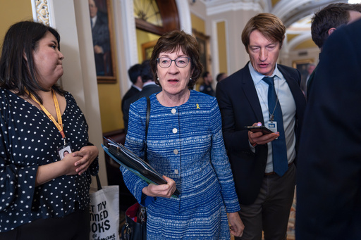 As the government shutdown moves into the second week, Senate Appropriations Committee Chairwoman Susan Collins, R-Maine, center, has suggested pushing ahead with a group of bipartisan spending bills that are pending and a then securing a commitment to discuss the health care issue as a way out of the impasse, at the Capitol in Washington, Tuesday, Oct. 7, 2025. (AP Photo/J. Scott Applewhite) As the government shutdown moves into the second week, Senate Appropriations Committee Chairwoman Susan Collins, R-Maine, center, has suggested pushing ahead with a group of bipartisan spending bills that are pending and a then securing a commitment to discuss the health care issue as a way out of the impasse, at the Capitol in Washington, Tuesday, Oct. 7, 2025. (AP Photo/J. Scott Applewhite)