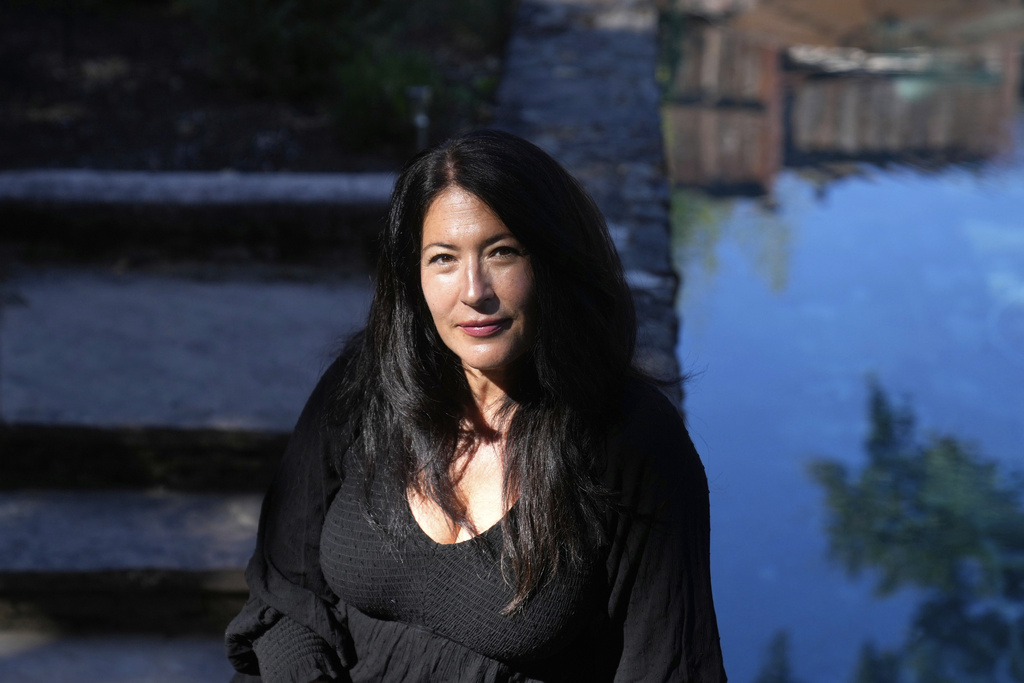 Ada Limón, 24th Poet Laureate of the United States, poses in Sonoma County, Calif., on Friday, Aug. 22, 2025. (AP Photo/Jeff Chiu)