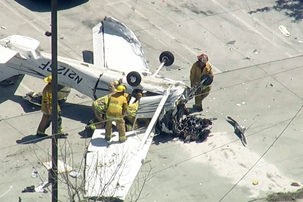 This image made from video provided by ABC7 Los Angeles shows a small plane crash, in the Pacoima neighborhood of Los Angeles, Monday, April 20, 2026. (ABC7 Los Angeles via AP)