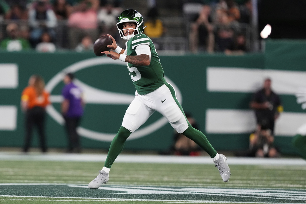 New York Jets quarterback Adrian Martinez (15) passes in the second half of a preseason NFL football game against the Philadelphia Eagles in East Rutherford, N.J., Friday, Aug. 22, 2025. (AP Photo/Yuki Iwamura)