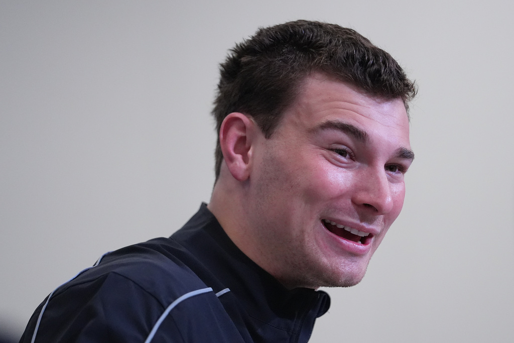 Indiana quarterback Fernando Mendoza, speaks during a news conference at the NFL football scouting combine in Indianapolis, Friday, Feb. 27, 2026. (AP Photo/Julio Cortez)