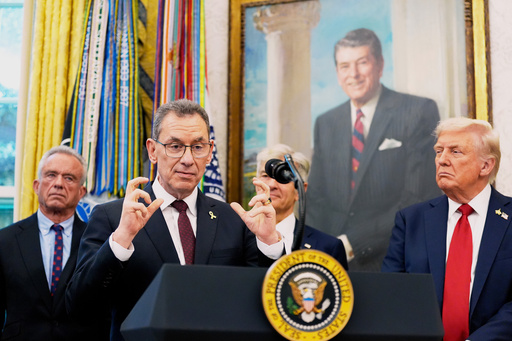 Albert Bourla, chairman and chief executive officer of the pharmaceutical company Pfizer. speaks in the Oval Office of the White House, Tuesday, Sept. 30, 2025, in Washington, as from left, Secretary of Health and Human Services Robert F. Kennedy, Jr., Mehmet Oz, Administrator for the Centers for Medicare & Medicaid Services and President Donald Trump, right, look on. (AP Photo/Alex Brandon) Albert Bourla, chairman and chief executive officer of the pharmaceutical company Pfizer. speaks in the Oval Office of the White House, Tuesday, Sept. 30, 2025, in Washington, as from left, Secretary of Health and Human Services Robert F. Kennedy, Jr., Mehmet Oz, Administrator for the Centers for Medicare & Medicaid Services and President Donald Trump, right, look on. (AP Photo/Alex Brandon)
