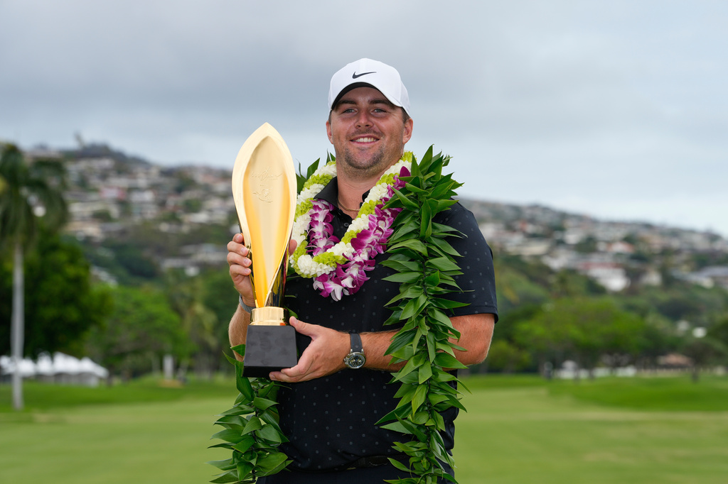 FILE - Chris Gotterup reacts after winning the Sony Open golf event at the Waialae Country Club, in Honolulu, Jan. 18, 2026. (AP Photo/Matt York, File)