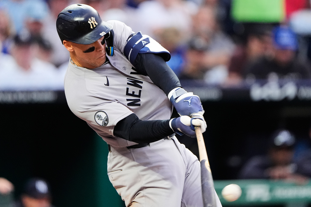 New York Yankees' Aaron Judge hits an RBI double during the fifth inning of baseball game against the Kansas City Royals, Tuesday, May 26, 2026, in Kansas City, Mo. (AP Photo/Charlie Riedel)